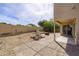 Large backyard featuring a water fountain, firepit, and desert landscaping at 3024 E Siesta Ln, Phoenix, AZ 85050