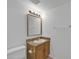 Clean bathroom featuring a mirror, vanity, and toilet at 3024 E Siesta Ln, Phoenix, AZ 85050