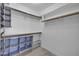 Walk-in closet with shelving and storage at 3024 E Siesta Ln, Phoenix, AZ 85050