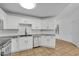 Bright kitchen featuring stainless steel appliances, granite countertops, and ample cabinet space at 3024 E Siesta Ln, Phoenix, AZ 85050