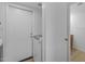 Clean laundry room with modern washer and dryer, and access door at 3024 E Siesta Ln, Phoenix, AZ 85050