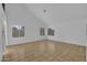 Spacious living room featuring high ceilings, neutral walls and light-filled windows at 3024 E Siesta Ln, Phoenix, AZ 85050