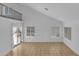 Spacious living room featuring high ceilings, neutral walls and light-filled windows at 3024 E Siesta Ln, Phoenix, AZ 85050