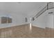 Spacious living room featuring high ceilings, neutral walls and light-filled windows at 3024 E Siesta Ln, Phoenix, AZ 85050