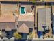 Aerial view of houses and neighborhood with a focus on the property's location and surroundings at 30313 W Mitchell Ave, Buckeye, AZ 85396