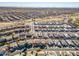 Aerial image showcasing a large suburban neighborhood with many homes at 30313 W Mitchell Ave, Buckeye, AZ 85396