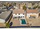 Two-story house with a pool and backyard, in a residential area at 30313 W Mitchell Ave, Buckeye, AZ 85396