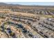 Aerial view of neighborhood featuring houses and desert landscape at 30313 W Mitchell Ave, Buckeye, AZ 85396