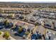 Aerial view of a residential neighborhood with houses and pools at 30313 W Mitchell Ave, Buckeye, AZ 85396