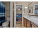 Bathroom with a toilet, shower, and double vanity at 30313 W Mitchell Ave, Buckeye, AZ 85396
