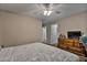 Spacious bedroom with dresser and ceiling fan at 30313 W Mitchell Ave, Buckeye, AZ 85396