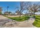 Community park with walking paths and sand volleyball court at 30313 W Mitchell Ave, Buckeye, AZ 85396