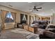 Bright living room with large windows and comfy seating at 30313 W Mitchell Ave, Buckeye, AZ 85396