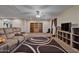 Bright loft with built-in shelving and ceiling fan at 30313 W Mitchell Ave, Buckeye, AZ 85396