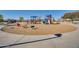 Modern playground with various play structures at 30313 W Mitchell Ave, Buckeye, AZ 85396