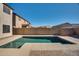 Clean, rectangular pool with brick patio at 30313 W Mitchell Ave, Buckeye, AZ 85396
