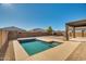 Inviting rectangular pool with a spacious patio at 30313 W Mitchell Ave, Buckeye, AZ 85396