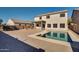 Relaxing backyard pool with patio and fire pit at 30313 W Mitchell Ave, Buckeye, AZ 85396