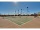 Well-maintained tennis courts with fencing and lighting at 30313 W Mitchell Ave, Buckeye, AZ 85396