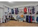 Large walk-in closet with ample shelving and hanging space at 30313 W Mitchell Ave, Buckeye, AZ 85396