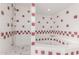 Bathroom with shower and corner bathtub, featuring a red and white checkered tile design at 3126 E Monte Vista Rd, Phoenix, AZ 85008
