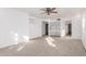 Large bedroom with ceiling fan, carpet, and abundant natural light at 3126 E Monte Vista Rd, Phoenix, AZ 85008