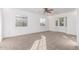 Bright bedroom with bay window, ceiling fan and carpet flooring at 3126 E Monte Vista Rd, Phoenix, AZ 85008