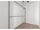 Large closet with a hanging rack, ideal for storage at 3126 E Monte Vista Rd, Phoenix, AZ 85008