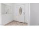 Bright entryway with tiled floor and elegant front door at 3126 E Monte Vista Rd, Phoenix, AZ 85008