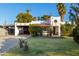 Spanish style home with carport and nicely landscaped yard at 3126 E Monte Vista Rd, Phoenix, AZ 85008
