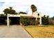 Spanish-style home with carport and mature landscaping at 3126 E Monte Vista Rd, Phoenix, AZ 85008