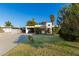 House with driveway and a large grassy front yard at 3126 E Monte Vista Rd, Phoenix, AZ 85008