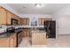 Spacious kitchen with ample cabinetry, island, and stainless steel appliances at 3126 E Monte Vista Rd, Phoenix, AZ 85008
