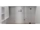 White laundry room with shelving and hookups at 3126 E Monte Vista Rd, Phoenix, AZ 85008