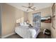 Bright bedroom with a queen bed and large window at 3462 E Riopelle Ave, Gilbert, AZ 85298