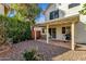 Landscaped backyard with covered patio at 3801 E Orchid Ln, Phoenix, AZ 85044