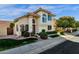 Two-story house with Spanish-style tile roof, and landscaped front yard at 3801 E Orchid Ln, Phoenix, AZ 85044