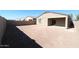 Large backyard with a block wall and covered patio at 38133 W Vera Cruz Dr, Maricopa, AZ 85138