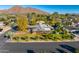 Aerial view of a mid-century modern home with a spacious yard at 3817 N Jokake Dr, Scottsdale, AZ 85251