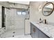 Elegant bathroom with marble vanity, walk-in shower, and modern fixtures at 3817 N Jokake Dr, Scottsdale, AZ 85251