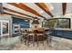 Modern kitchen with circular island and dark blue cabinetry at 3817 N Jokake Dr, Scottsdale, AZ 85251