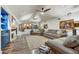 Cozy living room boasts hardwood floors, a fireplace, and comfortable seating at 3817 N Jokake Dr, Scottsdale, AZ 85251