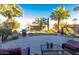 Spacious patio with seating area and putting green at 4021 S Tumbleweed Ct, Chandler, AZ 85248