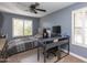 Bedroom with desk workspace and a ceiling fan at 4206 E Ellis Cir, Mesa, AZ 85205