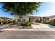 Mobile home with carport, landscaping, and spacious yard at 437 E Germann Rd # 24, San Tan Valley, AZ 85140