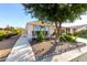 Mobile home with carport and nicely landscaped yard at 437 E Germann Rd # 24, San Tan Valley, AZ 85140