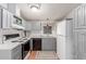 Well-equipped kitchen with gray cabinets and a modern design at 437 E Germann Rd # 24, San Tan Valley, AZ 85140