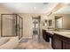 Large Primary bathroom with double vanity and walk-in shower at 472 W Dragon Tree Ave, Queen Creek, AZ 85140