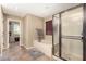 Spacious bathroom with a bathtub, shower, and tile floors at 472 W Dragon Tree Ave, Queen Creek, AZ 85140