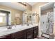 Double vanity bathroom with a separate shower and tub at 472 W Dragon Tree Ave, Queen Creek, AZ 85140